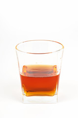 glass of elite brandy on a white background