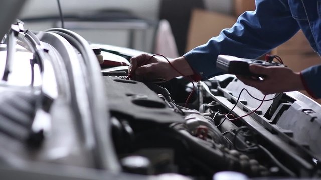 Professional car mechanic, auto repair concept