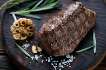 Grilled marbled beef asado steak, close-up, studio shot