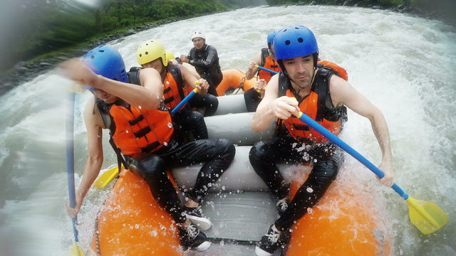 Experience the thrill of whitewater rafting with our team of seven,as we conquer large waves that crash against our raft,creating an exhilarating adventure with audio.