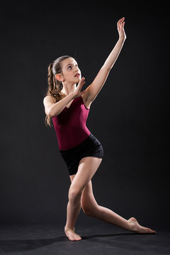 Portrait of young dancer in dramatic pose