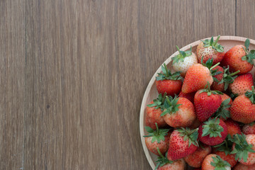Fresh strawberries on a table.