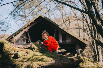 tale. fantastic redhead girl in a mysterious forest