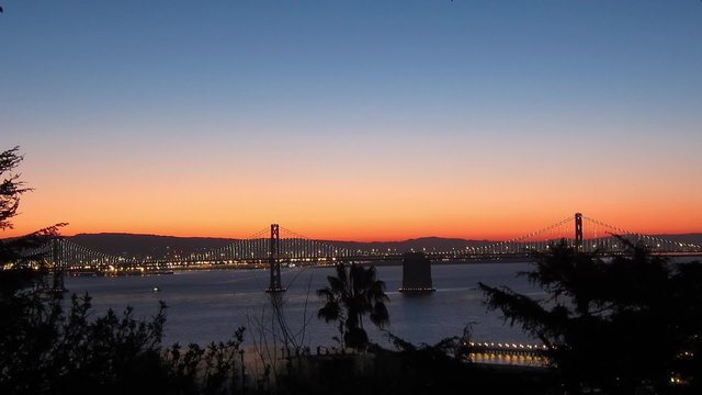 Time-lapse of San Francisco-Oakland Bay Bridge lights at sunrise