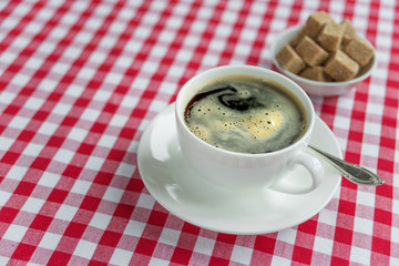 Black coffee in a white porcelain cup