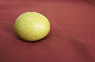 Easter eggs on soft red fabric