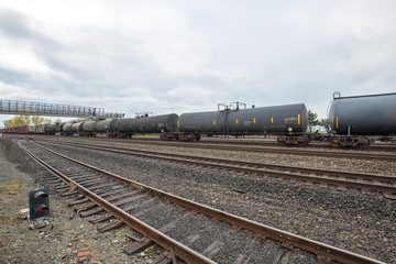 Fototapeta na wymiar oil tank train and railways in portland in cloudy sky
