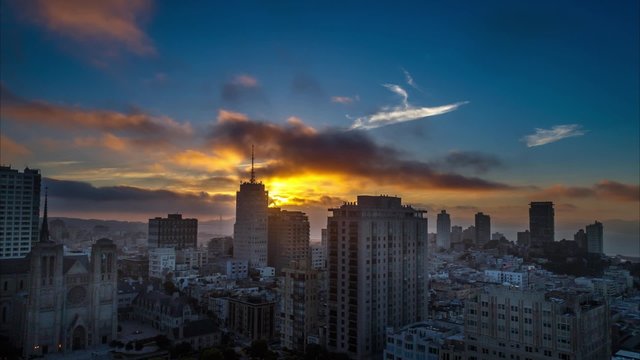 San Francisco skyline and city lights timelapse during sunset, California, USA
