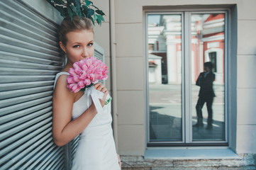 Portrait of beautiful bride with tulips. Wedding make up. - 106466663
