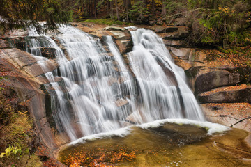 Fototapeta na wymiar Mumlava Waterfall in Krkonose Mountains