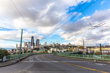 Fototapeta na wymiar traffic on road and cityscape and skyline of seattle