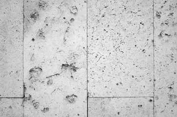 Damaged gray artificial stone wall texture