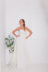 Beautiful bride blond girl in a wedding dress