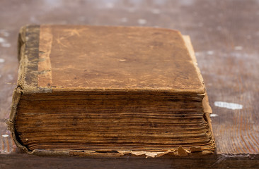 Old book on a wooden table
