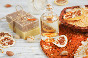 Composition of spa treatment on wooden background. Essential cit