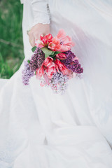 Vintage wedding bouquet with tulips and lilacs