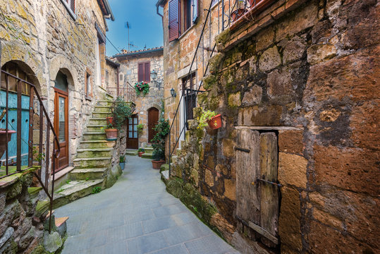 Fototapeta Beautiful magical nooks in the medieval town of Pitigliano.