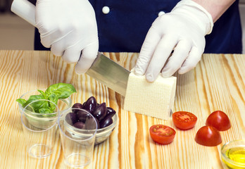 cook prepares canapes in the kitchen at the restaurant