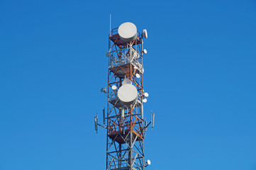 telecommunications antenna with blue sky background