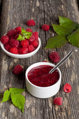 Raspberry jam ( marmalade ) and fresh raspberry