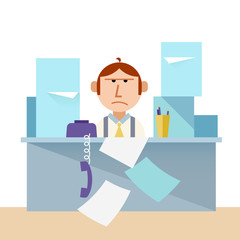 Unhappy man and table with stacks of papers