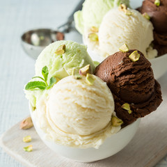 Colorful ive cream scoops in white bowl © anaumenko