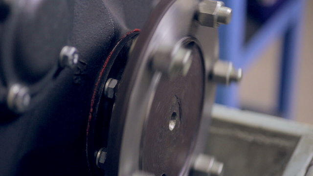 Industrial part of engine movement: steel circle with moving. HD.
