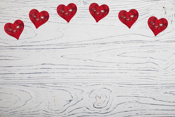 Hearts on old wood. Background Valentines Day. 