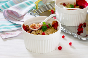 Dessert crumble with red currants in a rustic style