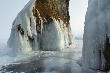 Huge icicles on rocks.