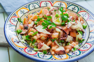 octopus salad on bowl