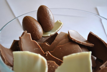 Cracked Eggs chocolate on white background.
