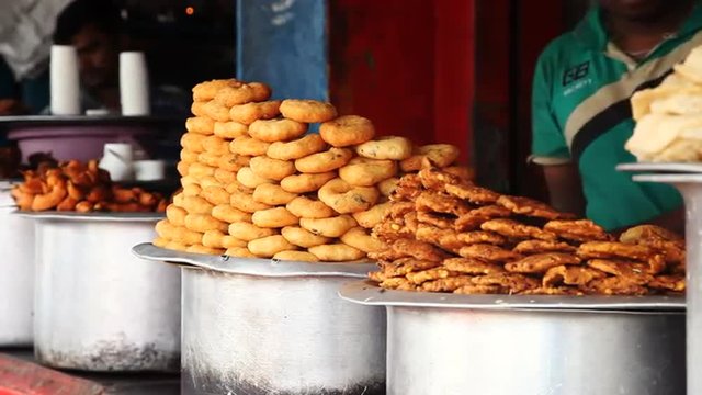 Pan shot of food for sale at market, Chamundeshwari Temple, Chamundi Hills, Mysore, Karnataka, India