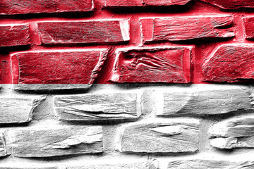 Brick wall Indonesia flag with some cracks and vintage look