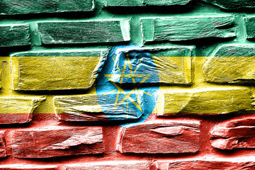 Brick wall Ethiopia flag with some cracks and vintage look