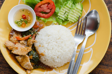 Thai food,spicy fried pork with pepper and jasmine rice