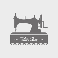 Tailor shop label, logo, emblem or designed element with sewing machine.