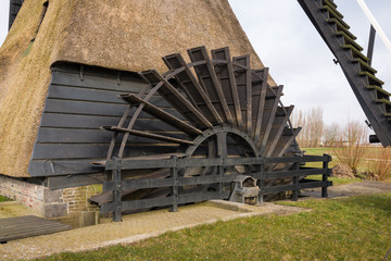Water wheel an old  polder mill from close