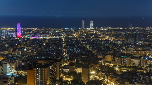 View of Barcelona timelapse, the Mediterranean sea, The tower Agbar and The twin towers from Bunkers Carmel. Catalonia, Spain.