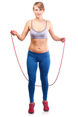 Girl jumping rope on a white background.