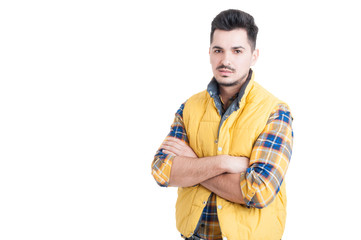 Portrait of beautiful man standing with arms crossed