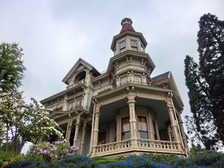 Old vintage Victorian ornate home exterior - landscape color photo