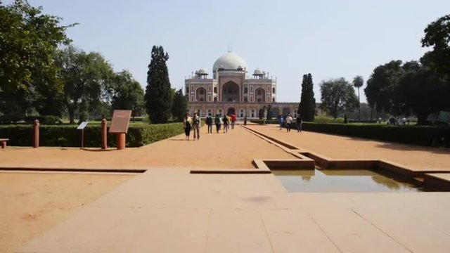 Locked-on shot of tourists at Humayun's Tomb, Nizamuddin East, Delhi, India 