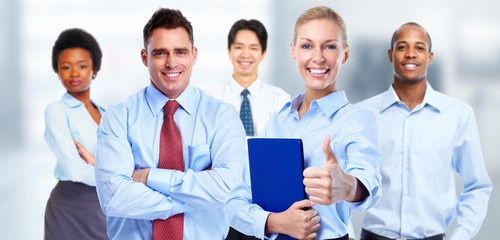 Happy business woman and group of workers.