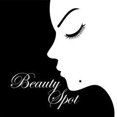 Girl with a beauty spot on chin 