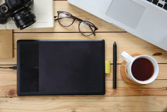 Working table of photographer or artist overhead view