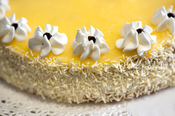 Lemon Cake with Icing Flowers and Coconut