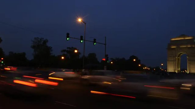 Time lapse shot of traffic moving in front of the India Gate, New Delhi, India 