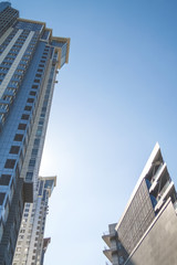 Fototapeta premium Modern buildings in contre-jour sunlight
