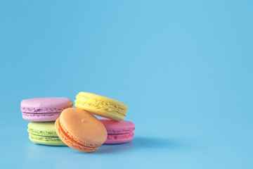 Colorful macaron on blue